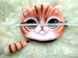 Plush orange tabby cat coin purse with a striped tail zipper pull and 14cm width measure