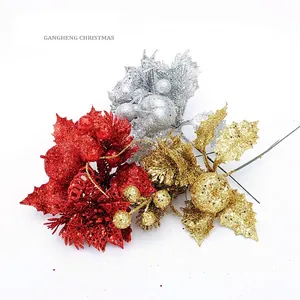 Glittery artificial Christmas picks with berries and pine needles in gold silver and red