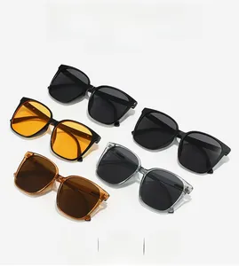 Flat lay of retro square sunglasses in multiple colors on a clean white background