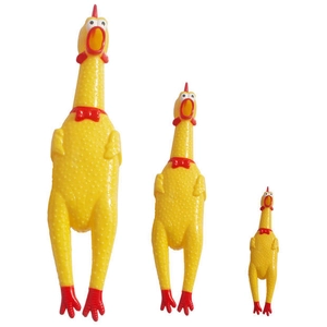 Three sizes of yellow rubber screaming chicken toys arranged on a white background