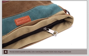 Detail of striped canvas bag with multi-color panels, PU leather logo, and metal zipper