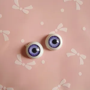 Detailed close-up of 12mm purple rainbow resin eyes for BJD dolls and DIY crafts