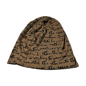 Brown slouchy beanie with black cursive letter print on a clean white background