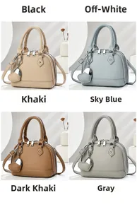 Detail view of stylish Boston tote bag with lychee texture and heart charm in four colors