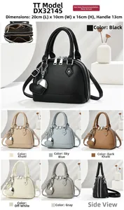 Detail view of lychee texture shell bag with heart charm and dual zipper compartments
