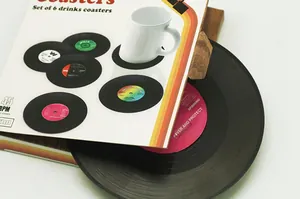Set of 6 vintage vinyl record coasters with retro labels and wooden storage stand