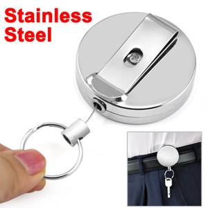 Polished stainless steel retractable key holder detail with belt clip and pull-out demo