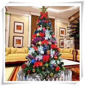 Decorated Christmas tree featuring colorful ornaments, bows, snowflakes and a tree topper star