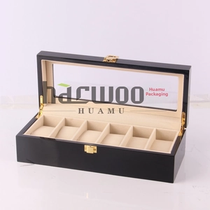 Detail of 6-slot wooden watch box with piano black finish and clear display window