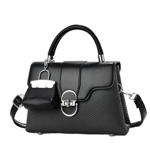 Black mixed-material handbag with matte leather, woven texture, and silver D-buckle lock