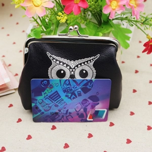 Compact PU leather coin purse with owl print and vintage metal clasp for scale