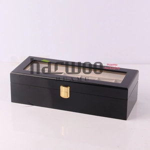 Glossy black wooden watch box with glass window and six slots for watch storage