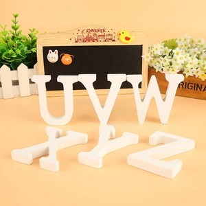 White wooden letters U V W X Y Z for home decor and wedding photography setup