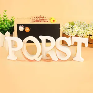 White wooden letters P Q R S T set for wedding home decor and photography props