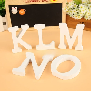 White wooden letters K-O decor for weddings and minimalist home photography props