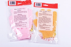 Close-up of pink and orange exfoliating bath gloves in professional retail packaging