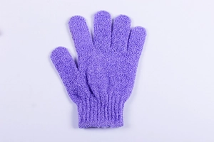 Macro detail of purple nylon exfoliating bath glove with textured five-finger design