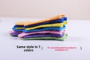 Exfoliating nylon bath gloves in seven colors showing honeycomb texture and durable weave