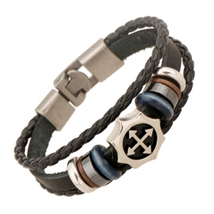 Detail of multilayer woven leather bracelet featuring silver star charm and colorful beads