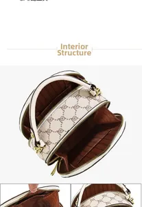 Detailed interior view showing multi-layer compartments and gold zipper of the round bag