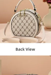 Back view of a round crossbody bag with letter print and adjustable shoulder strap