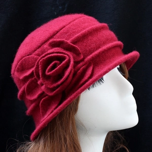 Elegant dark red wool cloche hat for women with a 3D floral accent on a side view