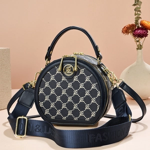 Navy blue round crossbody bag with letter print and adjustable wide strap