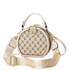 Chic beige round crossbody bag with brown monogram print and wide logo strap