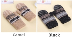 Close-up of thick knitted mittens with Nordic snowflake patterns in camel and black