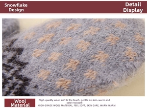 Detail of wool knit gloves with gray and orange snowflake pattern and warm texture
