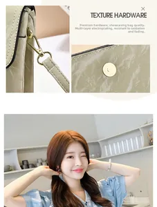 Detail of light green wrinkled texture bag showing gold hardware and strap connection