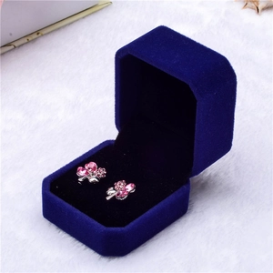 Pink rhinestone clover earrings in a royal blue velvet jewelry gift box