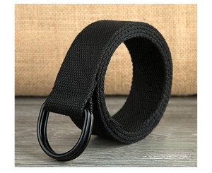 Detail of black woven canvas belt featuring metallic double D-ring buckle on wood texture