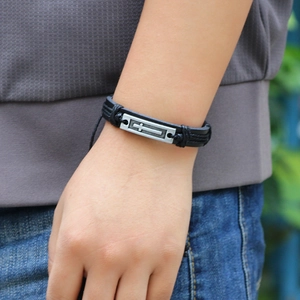 Men's retro black braided leather bracelet featuring an antique silver cross metal plate