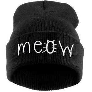 Detail of white Meow embroidery with cat ears design on black knitted beanie hat