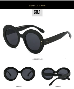 Vues multiples de lunettes de soleil ovales noires avec rivets dorés et verres foncés