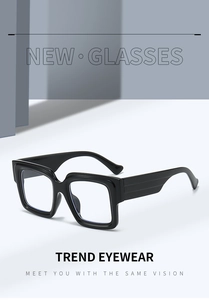 Close-up of stylish black square frames with wide temples and durable metal hinges
