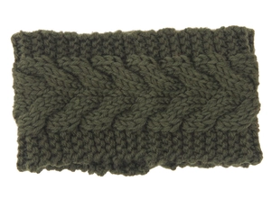 Close-up of thick knit headband in dark green with classic braided twist pattern