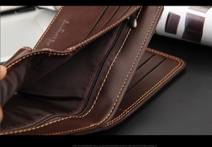 Detail shot of deep brown leather wallet interior showing multiple card slots and smooth zipper