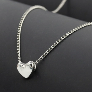 Elegant minimalist silver heart pendant necklace for women with polished finish