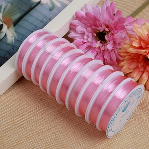 Close-up of 0.8mm pink stretchy elastic bead cord for DIY jewelry making and crafting