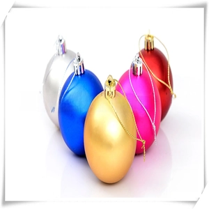 Detail of 3cm matte Christmas balls in multiple colors with hanging hooks and strings