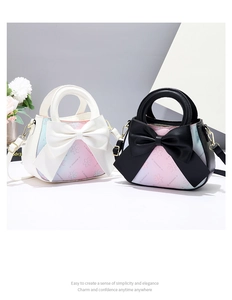 Detail of macaron gradient crossbody bag with large bow and cherry blossom texture