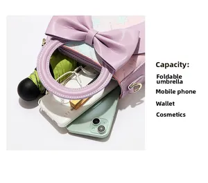 Internal view of floral handbag showing capacity for phone, umbrella, and cosmetics