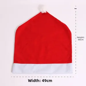 Front view of red Christmas hat chair cover with dimensions height 66cm and width 49cm