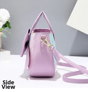 Detailed side view of gradient purple crossbody bag with leather bow and golden metal hardware