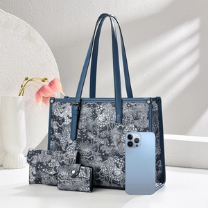 Three-piece tote bag set with elegant blue floral patterns and long handles
