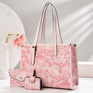 Pink floral three-piece bag set with large tote, envelope clutch and small card holder