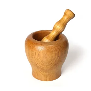 Mortaio e pestello in legno massiccio con venature naturali per macinare aglio ed erbe aromatiche
