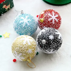 Set of four snowy Christmas foam balls in red, blue, gold, and black for tree decoration